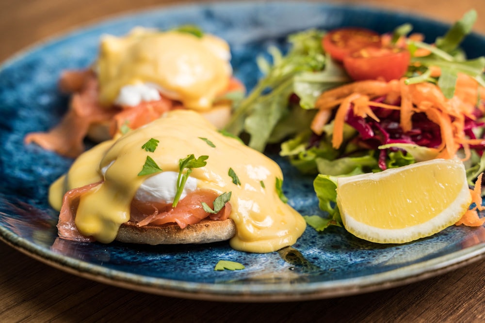 Eggs Benedict with smoked salmon and hollandaise, close up